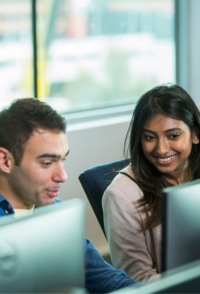 two-students-looking-at-the-screen